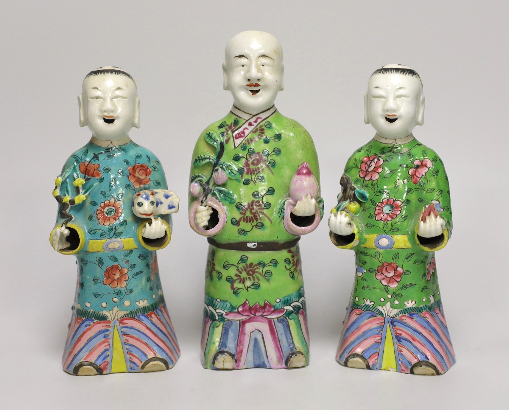 A near pair of Chinese polychrome-decorated figural incense burners and another similar incense burner, Jiaqing period (1796-1820), tallest 20.5cm